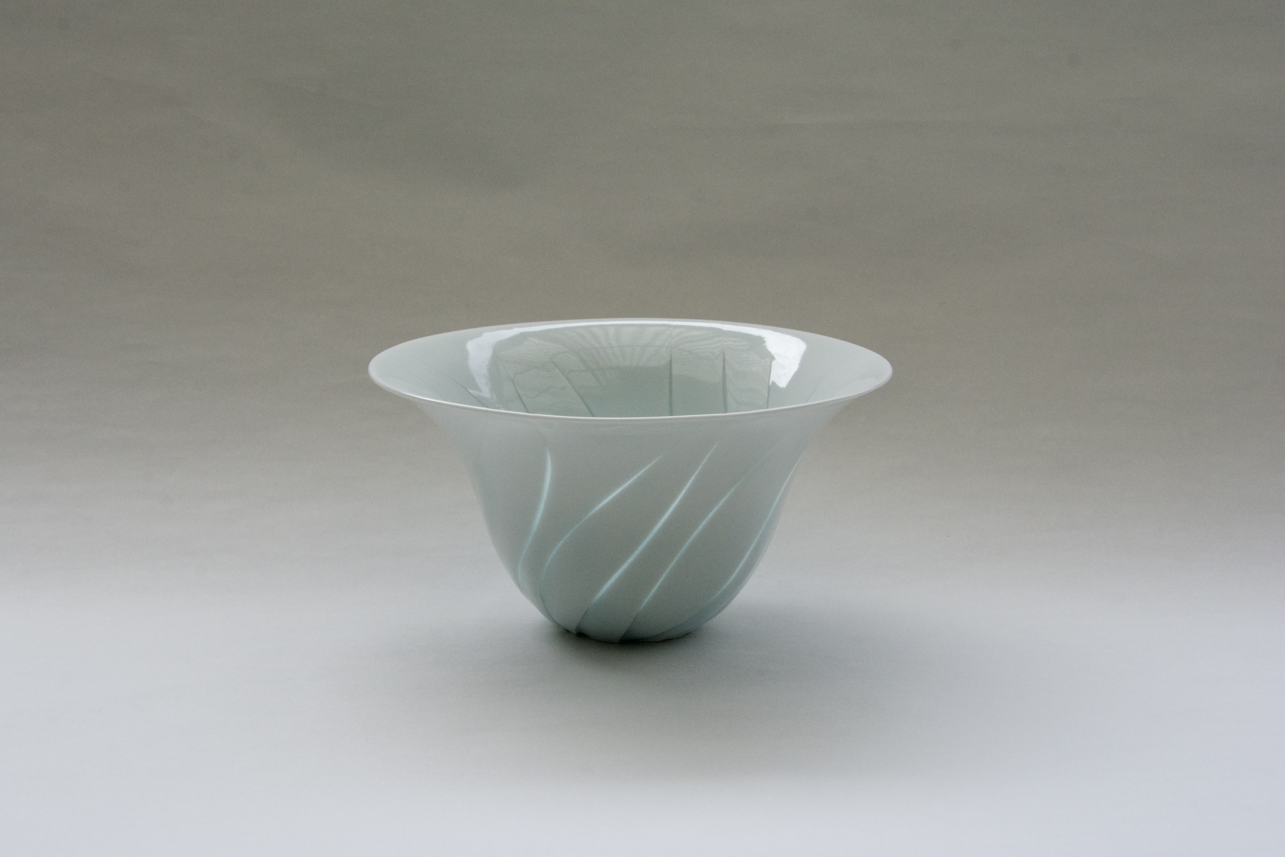 Pottery artist Hiroshi Taruta uses his unique Hotarute technique to bring natural light into his vessels.